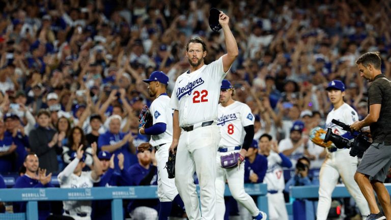Los Angeles Dodgers pitcher Clayton Kershaw (22) tips his cap after striking out Chicago White Sox's Vinny Capra during the sixth inning for his 3,000th career strikeout Wednesday, July 2, 2025, in Los Angeles. (Kevork Djansezian/AP)