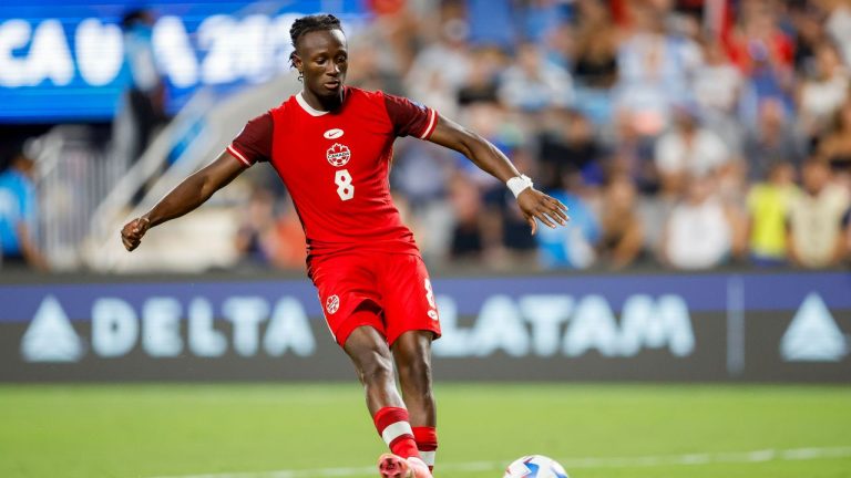 Canada midfielder Ismaël Koné shoots in a penalty shootout the Copa America third place soccer match against Uruguay in Charlotte, N.C., Saturday, July 13, 2024. (Nell Redmond/AP)