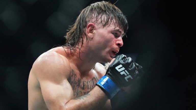 Diego Lopes battles Alexander Volkanovski during a mixed martial arts fight at UFC 314, Sunday, April 13, 2025, in Miami. (Lynne Sladky/AP)