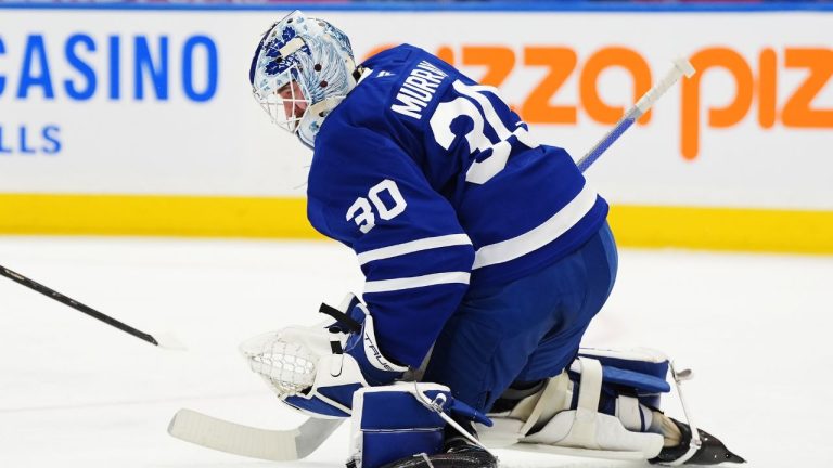 The puck gets by Toronto Maple Leafs goaltender Matt Murray (30) for a goal by Washington Capitals' Andrew Mangiapane (not shown) during first period NHL hockey action in Toronto on Saturday, Dec. 28, 2024. (Frank Gunn/CP)
