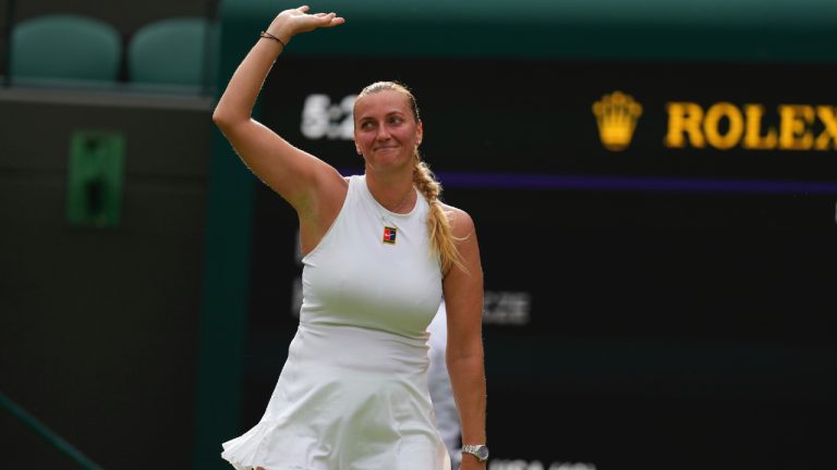 Petra Kvitova waves to the crowd after her first round women's single match against Emma Navarro of the U.S. at the Wimbledon Tennis Championships in London, Tuesday, July 1, 2025. (Kirsty Wigglesworth/AP)