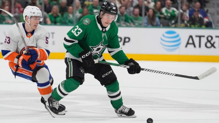 Dallas Stars defender Derrick Pouliot skates to the puck again New York Islanders centre Casey Cizikas during the first period an NHL game in Dallas, Monday, Feb. 26, 2024. (AP/LM Otero)