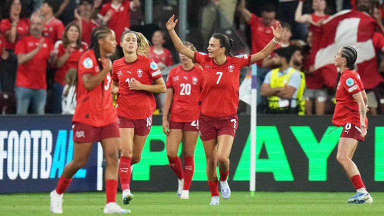 Switzerland's Riola Xhemaili, center, celebrates after scoring her side's first goal during the Euro 2025, group A, soccer match between Finland and Switzerland at Stade de Geneve in Geneva, Switzerland. (Alessandra Tarantino/AP)