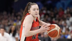 Canada's Syla Swords drives toward the basket during a women's basketball game against Canada at the 2024 Summer Olympics. (Michael Conroy/AP)