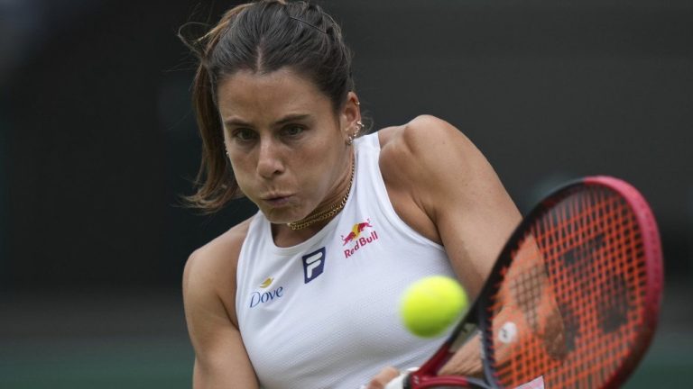 Emma Navarro of the U.S. returns to Barbora Krejcikova of Czech Republic during their women's singles third round match at the Wimbledon Tennis Championships in London, Saturday, July 5, 2025.(AP/Alastair Grant)
