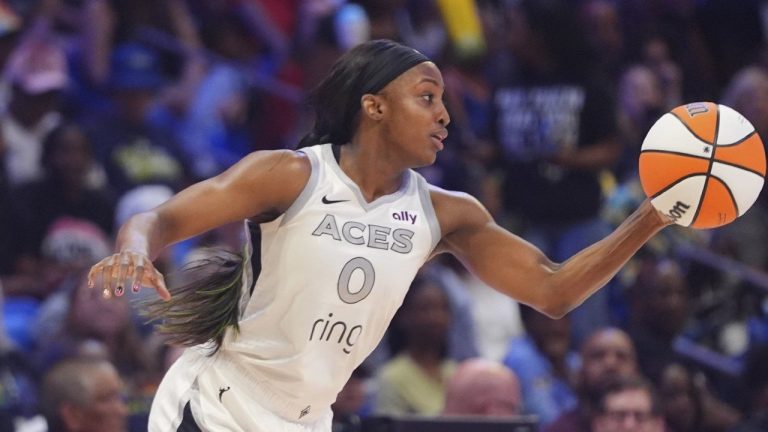 Las Vegas Aces guard Jackie Young takes control of the ball during the first half of a WNBA game against the Dallas Wings in Arlington, Texas, Sunday, July 27, 2025. (AP/LM Otero)