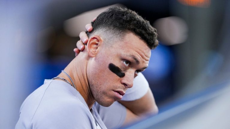 New York Yankees outfielder Aaron Judge (99) looks on from the dug out against the Toronto Blue Jays during fifth inning MLB baseball action, in Toronto on Thursday, July 3, 2025. (Thomas Skrlj/CP)