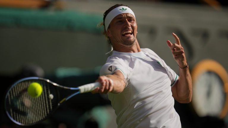 Alexander Zverev of Germany returns to Arthur Rinderknech of France during their first round men's singles match at the Wimbledon Tennis Championships in London, Tuesday, July 1, 2025. (Kin Cheung/AP)