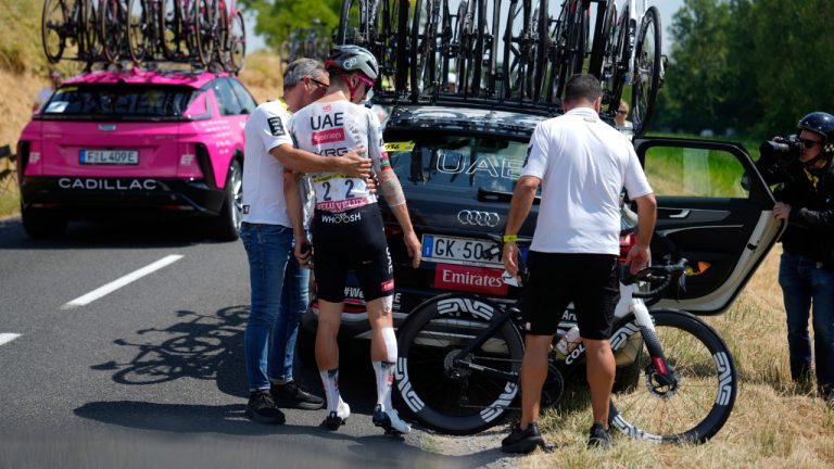 Portugal's Joao Almeida retires from the race during the ninth stage of the Tour de France cycling race over 174.1 kilometres (108 miles) with start in Chinon and finish in Chateauroux, France, Sunday, July 13, 2025. (Mosa'ab Elshamy/AP)