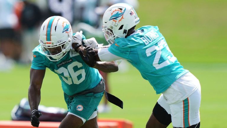 Miami Dolphins cornerback Storm Duck (36) and cornerback Artie Burns (23) run drills during practice at NFL football minicamp, Wednesday, June 11, 2025, in Miami Gardens, Fla. (Lynne Sladky/AP)