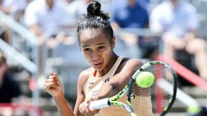 Leylah Fernandez, of Canada, plays a shot to Maya Joint, of Australia, during their first round match at the National Bank Open tennis tournament in Montreal, Tuesday, July 29, 2025. (Graham Hughes/CP)