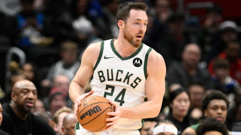 Milwaukee Bucks guard Pat Connaughton controls the ball during the first half of an NBA basketball game against the Washington Wizards, Feb. 21, 2025, in Washington. (Nick Wass/AP)