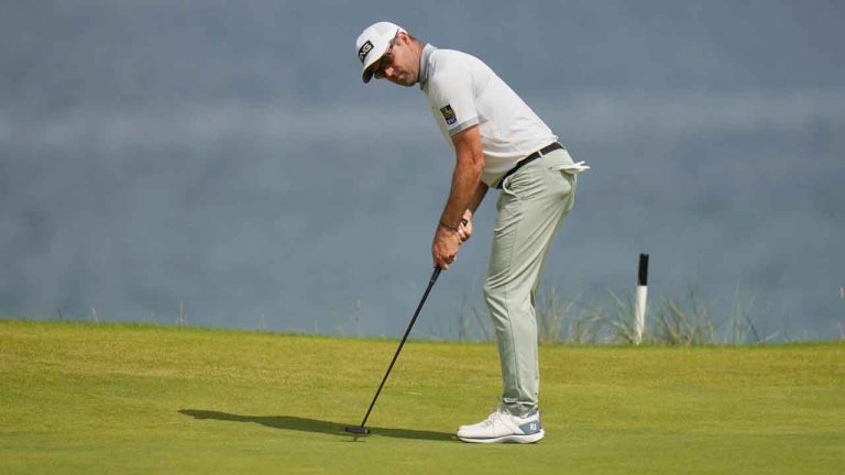 Corey Conners of Canada putts on the fifth green during the final round of the Open Championship at the Royal Portrush Golf Club, Northern Ireland. (Francisco Seco/AP)