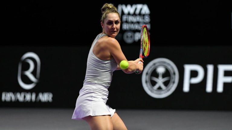 Canada's Gabriela Dabrowski plays a shot next to New Zealand's Erin Routliffe during their women's doubles match against Taylor Townsend of the U.S. and Katerina Siniakova of the Czech Republic in the final of the WTA finals at King Saud University Indoor Arena, in Riyadh, Saudi Arabia, Saturday, Nov. 9, 2024. (AP)
