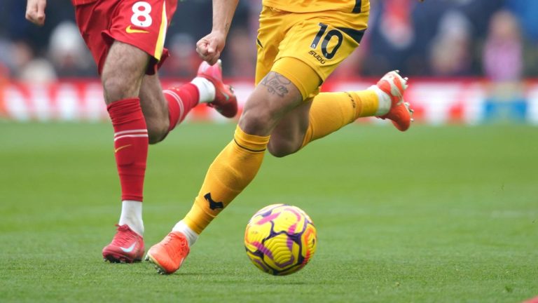 Wolverhampton Wanderers' Matheus Cunha, centre, controls the ball ahead Liverpool's Dominik Szoboszlai, left, during the English Premier League soccer match between Liverpool and Wolverhampton Wanderers at Anfield Stadium in Liverpool, Sunday, Feb. 16, 2025. (Ian Hodgson/AP)