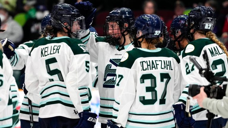 Boston Fleet's Hilary Knight (21) celebrates the win with Megan Keller (5) during third period PWHL hockey action in Ottawa, on Saturday, March 15, 2025. (Justin Tang/CP)