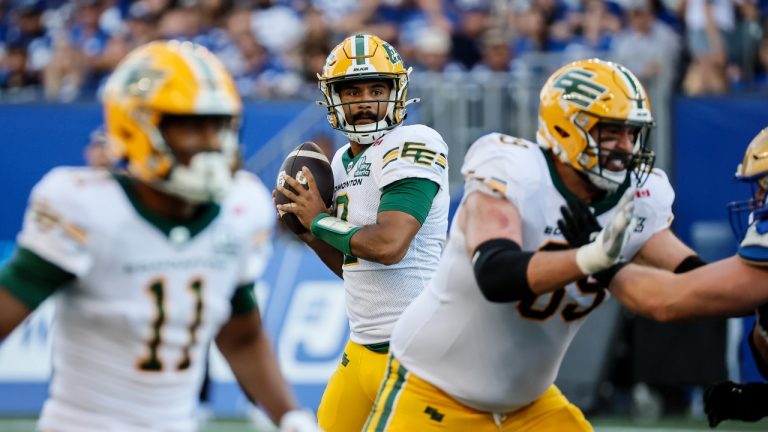 Edmonton Elks quarterback Tre Ford (2) looks for a receiver during first half CFL action against the Winnipeg Blue Bombers in Winnipeg Thursday, June 26, 2025. (John Woods/THE CANADIAN PRESS)