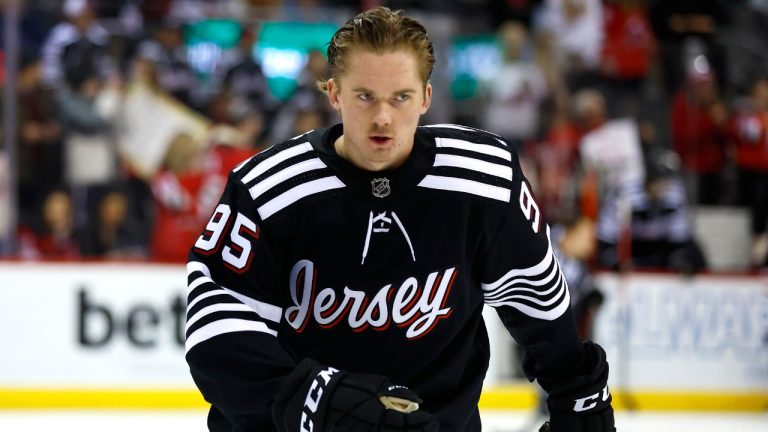 New Jersey Devils right wing Graeme Clarke (95) skates during warm up before an NHL hockey game against the Vancouver Canucks, Saturday, Jan. 6, 2024, in Newark, N.J. (Noah K. Murray/AP)