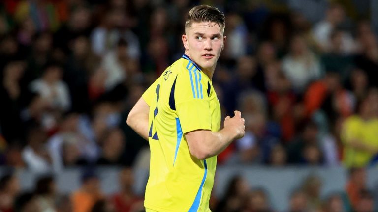 Sweden's Viktor Gyokeres runs back to his side of the pitch after scoring his team's first goal during a friendly soccer match between Portugal and Sweden at the D. Afonso Henriques stadium in Guimaraes, Portugal, Thursday, March 21, 2024. (Luis Vieira/AP)