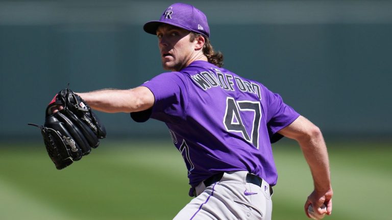 Colorado Rockies starting pitcher Jake Woodford warms up during the first inning of a spring training baseball game against the Arizona Diamondbacks Wednesday, March 19, 2025, in Scottsdale, Ariz. (Ross D. Franklin/AP)