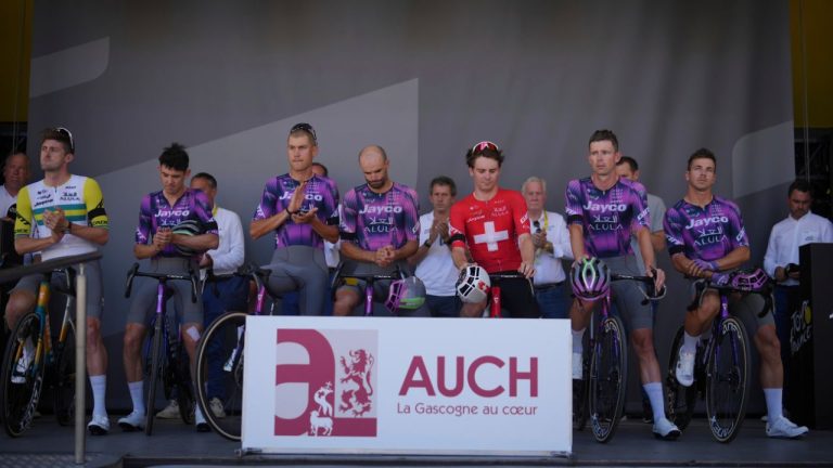 Team Jayco Alula mourns the death of Italian cyclist Samuele Privitera before the start of the twelfth stage of the Tour de France cycling race over 180.6 kilometres (112.2 miles) with start in Auch and finish in Hautacam, France, Thursday, July 17, 2025. (Thibault Camus/AP)