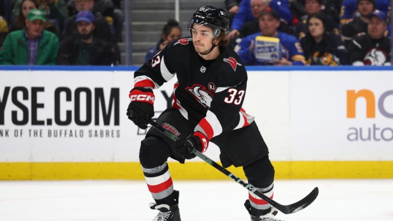 Buffalo Sabres defenceman Ryan Johnson (33) passes the puck the puck during the second period of an NHL hockey game against the Vegas Golden Knights Saturday, March 2, 2024, in Buffalo, N.Y. (Jeffrey T. Barnes/AP)