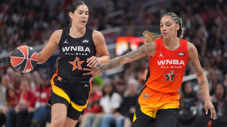 Los Angeles Sparks's Kelsey Plum, left, goes to the basket against Seattle Storm's Gabby Williams during the second half of a WNBA All-Star basketball game, Saturday, July 19, 2025, in Indianapolis. (Michael Conroy/AP)