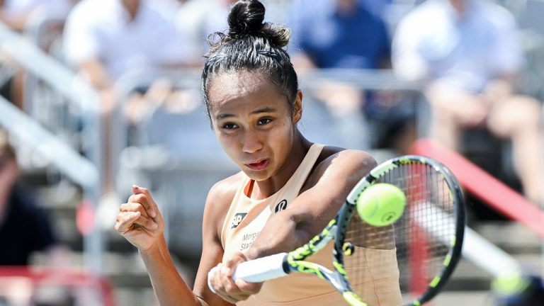Leylah Fernandez, of Canada, plays a shot to Maya Joint, of Australia, during their first round match at the National Bank Open tennis tournament in Montreal, Tuesday, July 29, 2025. THE CANADIAN PRESS/Graham Hughes