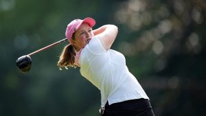 Lottie Woad, of England, plays on the 4th hole during the last round of the Evian Championship women's golf tournament, in Evian, eastern France, Sunday, July 13, 2025. (Laurent Cipriani/AP)