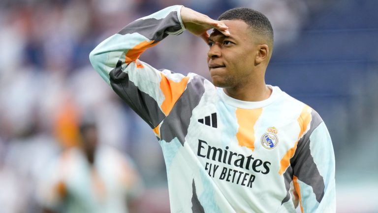 Real Madrid's Kylian Mbappe warms-up prior to a Spanish La Liga soccer match against Real Sociedad at Santiago Bernabeu stadium in Madrid, Saturday, May 24, 2025. (Cesar Cebolla/AP)