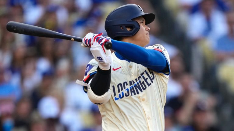Los Angeles Dodgers' Shohei Ohtani hits a two-run home run during the third inning of a baseball game against the Milwaukee Brewers, Saturday, July 19, 2025, in Los Angeles. (Mark J. Terrill/AP)