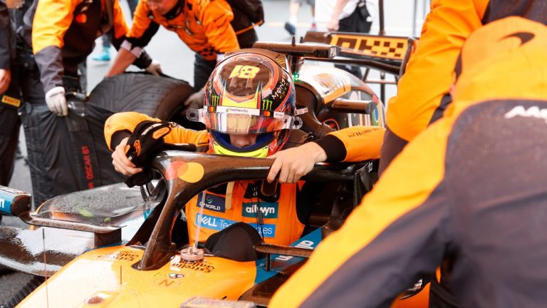 McLaren driver Oscar Piastri of Australia gets into his car during the Formula One Grand Prix at the Spa-Francorchamps racetrack in Spa, Belgium, Sunday, July 27, 2025. (Geert Vanden Wijngaert/AP)