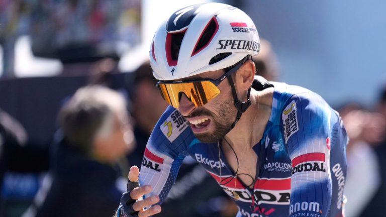 France's Valentin Paret Peintre crosses the finish line to win the sixteenth stage of the Tour de France cycling race over 171.5 kilometres (106.6 miles) with start in Montpellier and finish on the Mont Ventoux, France, Tuesday, July 22, 2025. (Mosa'ab Elshamy/AP)