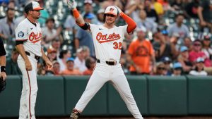 Baltimore Orioles' Ryan O'Hearn (32) celebrates after hitting an RBI triple during the fourth inning in the second baseball game of a doubleheader against the Toronto Blue Jays, Tuesday, July 29, 2025, in Baltimore. (Stephanie Scarbrough/AP)