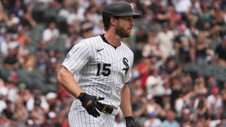 Chicago White Sox's Austin Slater runs after hitting a one-run single during the fifth inning of a baseball game against the Cleveland Guardians in Chicago, Sunday, July 13, 2025. (Nam Y. Huh/AP)