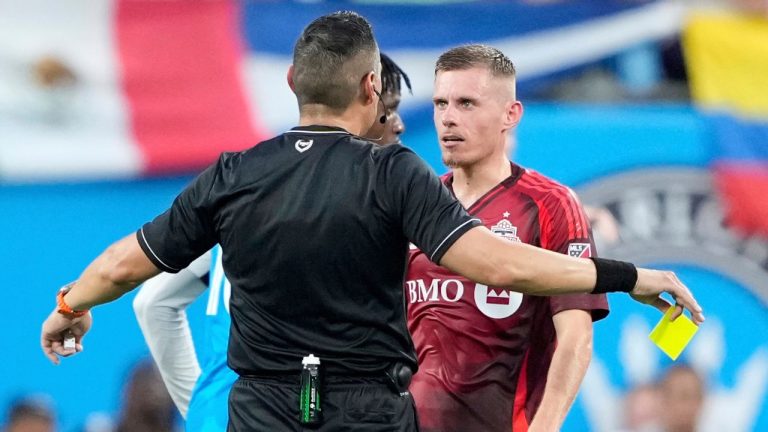 Toronto FC midfielder Maxime Dominguez gets a yellow card during the first half of a MLS soccer game against the Charlotte FC Saturday, July 26, 2025, in Charlotte, N.C. (Chris Carlson/AP Photo)