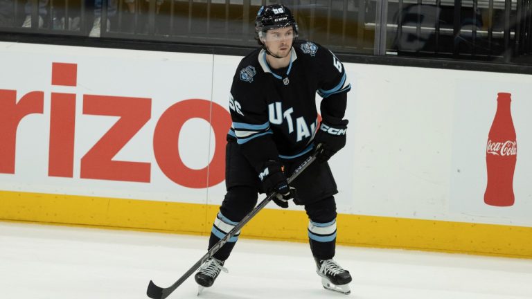 Kailer Yamamoto (56) moves the puck against the Los Angeles Kings during the third period of an NHL hockey game, Thursday, April. 3, 2025, in Salt Lake City. (Melissa Majchrzak/AP)