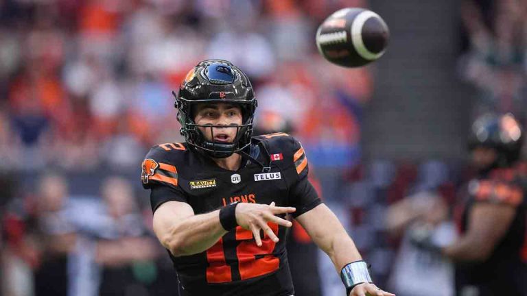 B.C. Lions quarterback Nathan Rourke passes during the first half of a CFL football game against the Hamilton Tiger-Cats, in Vancouver, on Sunday, July 27, 2025. (Darryl Dyck/CP)