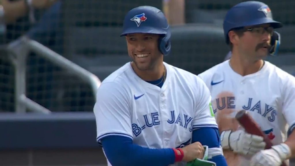 George Springer smiling after being hit by a pitch.