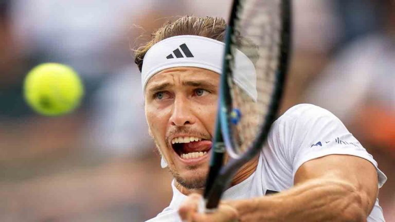Germany's Alexander Zverev hits a backhand return to Australia's Alexei Popyrin during their quarterfinal match at the National Bank Open in Toronto, Saturday, Aug. 4, 2025. (Frank Gunn/CP)