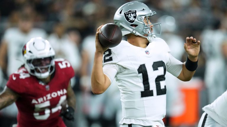 Las Vegas Raiders quarterback Aidan O'Connell (12) throws against the Arizona Cardinals during the first half of an NFL preseason football game, Saturday, Aug. 23, 2025, in Glendale. (Ross D. Franklin/AP)