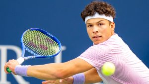 Ben Shelton of the USA hits a backhand return to Flavio Cobolli of Italy during their match at the National Bank Open in Toronto, Sunday, Aug. 3, 2025. (Frank Gunn/CP)