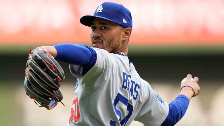 Los Angeles Dodgers' Mookie Betts warms up before during a baseball game against the Milwaukee Brewers, Monday, July 7, 2025, in Milwaukee. (Aaron Gash/AP)