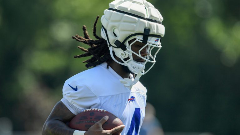 Buffalo Bills running back James Cook runs with the ball during practice at the team's NFL football training camp, Thursday, July 24, 2025, in Pittsford, N.Y. (Adrian Kraus/AP)