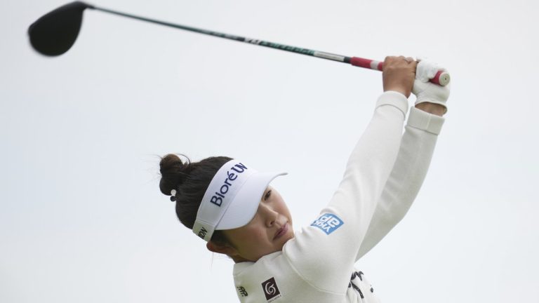 Miyu Yamashita of Japan plays off the 3rd tee during the third round of the Women's British Open golf championship, at Royal Porthcawl Golf Club in Porthcawl, Wales, Saturday, Aug. 2, 2025. (AP Photo/Kin Cheung)