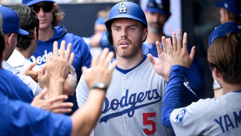 Los Angeles Dodgers' Freddie Freeman celebrates after scoring on a single by Andy Pages during the sixth inning of a game against the Tampa Bay Rays, Sunday, Aug. 3, 2025, in Tampa, Fla. (Jason Behnken/AP)