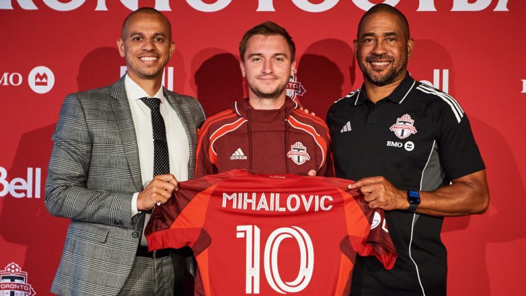 Toronto FC General Manager Jason Hernandez, Toronto FC midfielder Djordje Mihailovic and Toronto FC Head Coach Robin Fraser are photographed after a press conference in Toronto, on Friday, Aug. 8, 2025. (Sammy Kogan/CP)