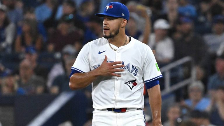 Toronto Blue Jays starting pitcher Jose Berrios (17) reacts to making the final out of the first inning against the Texas Rangers in first inning MLB baseball action in Toronto, on Sunday, Aug. 17, 2025. THE CANADIAN PRESS/Jon Blacker