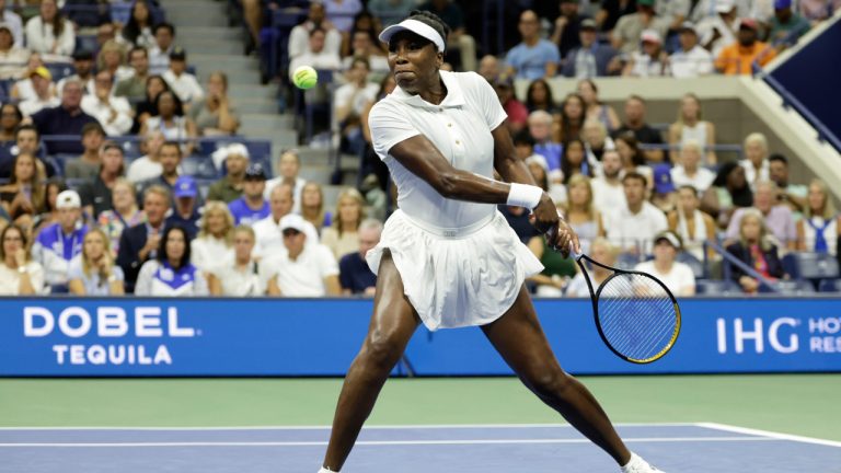 Venus Williams, of the United States, returns a shot to Karolina Muchova, of the Czech Republic, during the first round of the U.S. Open championships, Monday, Aug. 25, 2025. (Adam Hunger/AP)