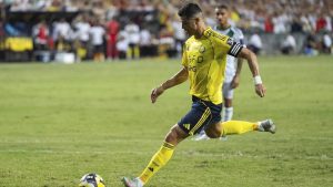 Al Nassr's Cristiano Ronaldo scores a goal with a penalty kick during the Saudi Super Cup final soccer match between Al Ahli and Al Nassr at the Hong Kong Stadium in Hong Kong, Saturday, Aug. 23, 2025. (Chan Long Hei/AP)